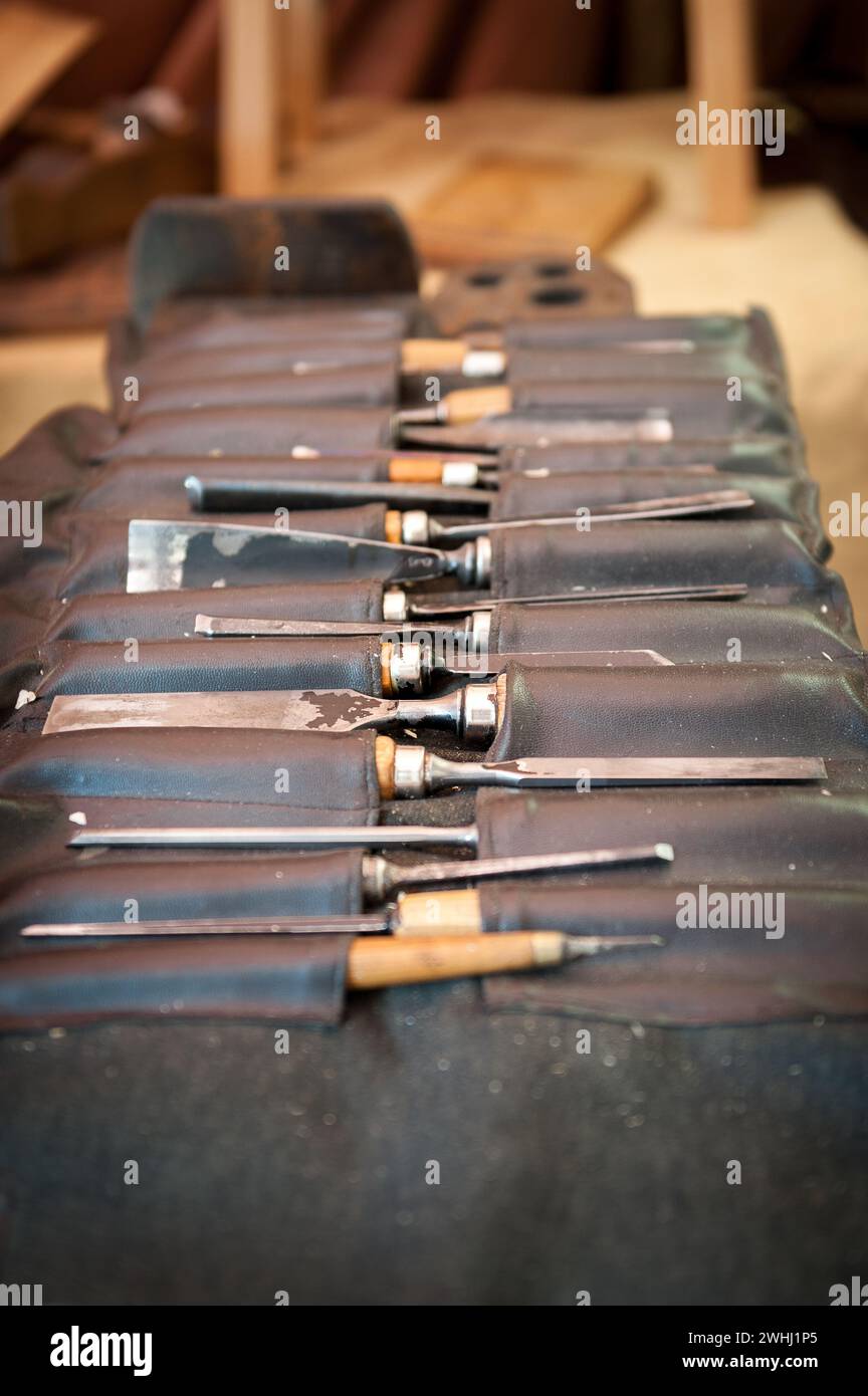 Case with gouges for wood in foreground in vertical format Stock Photo ...