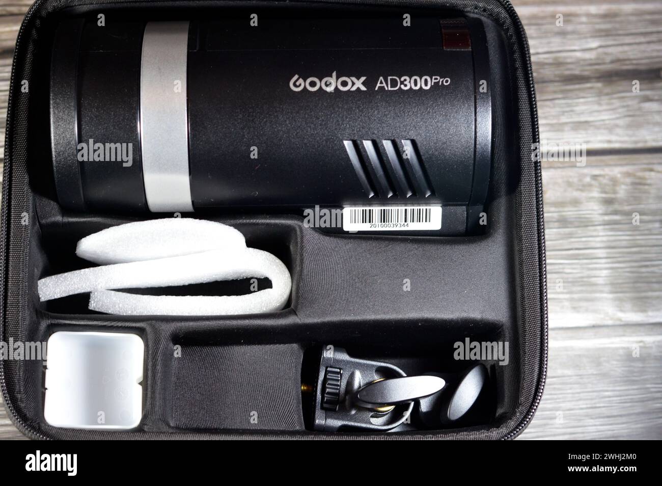 Cairo, Egypt, February 9 2024: A portable Godox AD300 Pro outdoor flash head, a great asset on location or in the studio with a lithium-ion battery, p Stock Photo