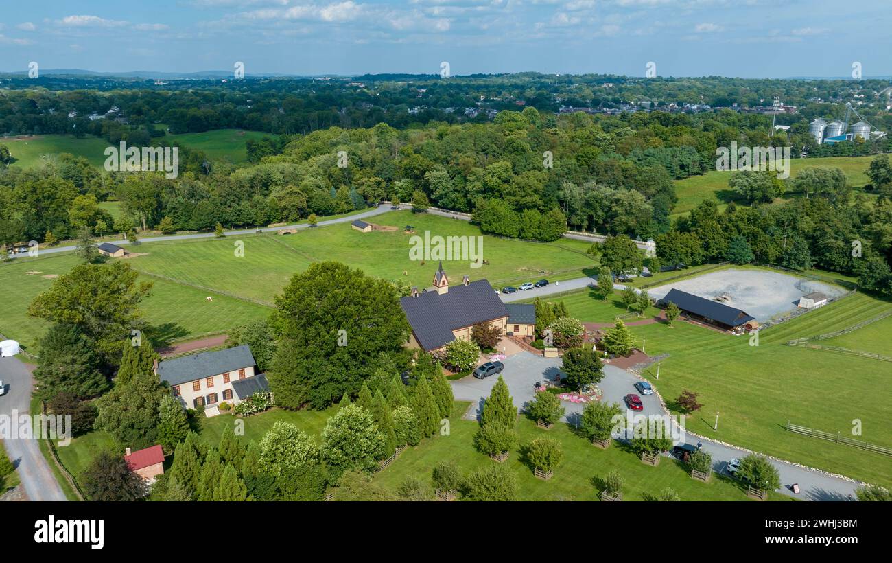 Aerial View Of A Rural Landscape With Various Buildings, Including A ...