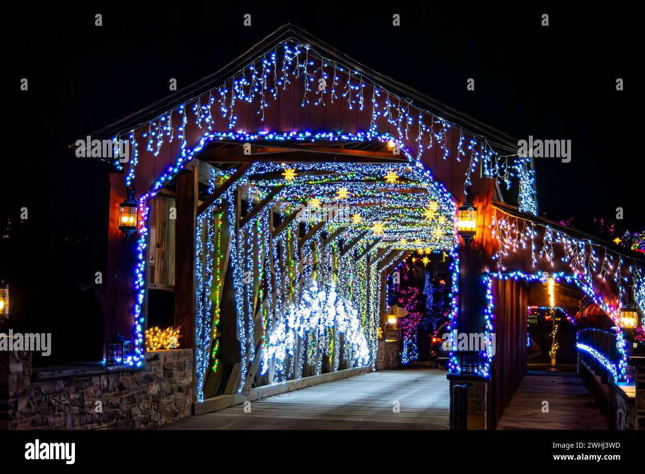 Entrance Of Herr's Mill Covered Bridge Adorned With Twinkling Blue And