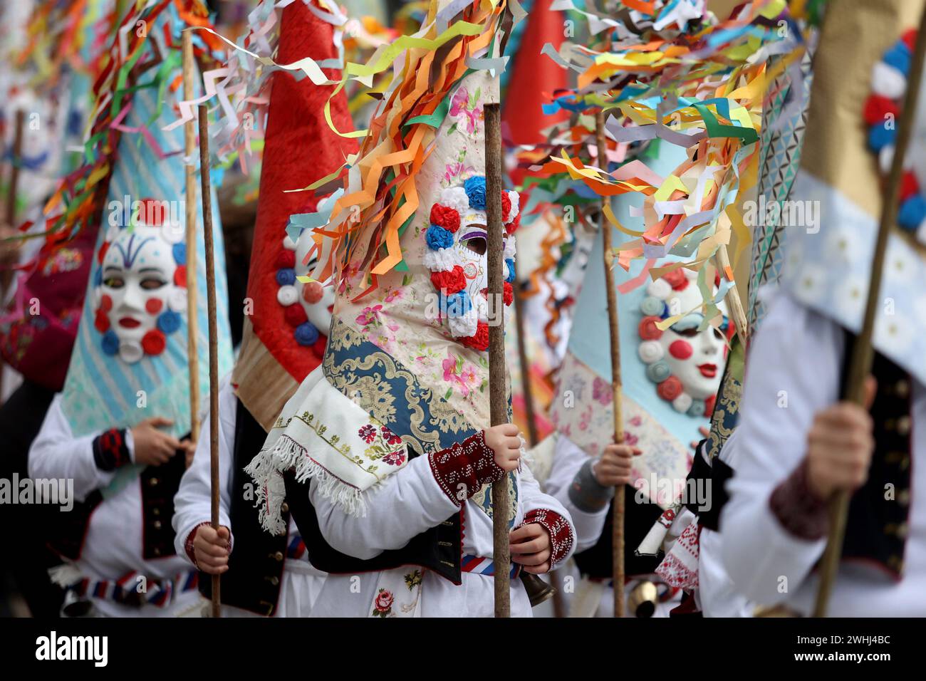 Matulji, Croatia. 10th Feb, 2024. People in costumes take part in the