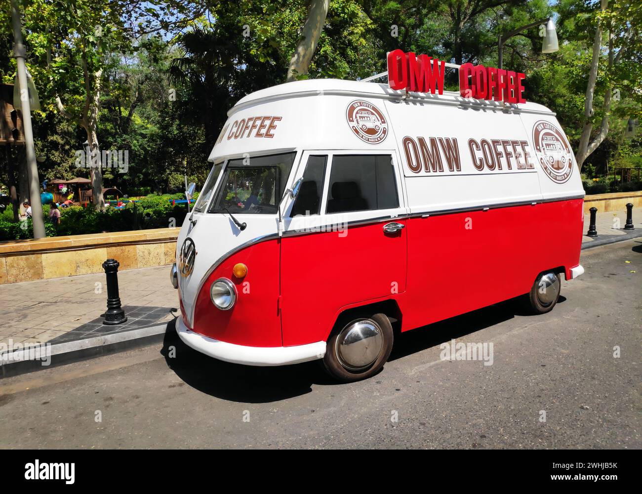 BAKU, AZERBAIJAN JULY 11, 2023 Street coffee shop of old retro minibus. car is equipped for