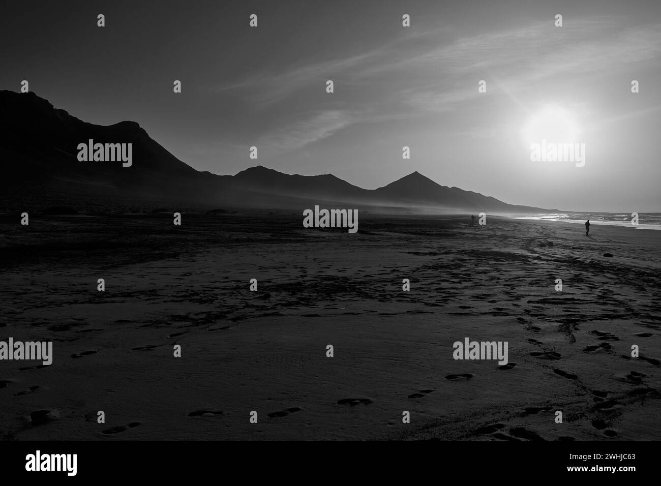 Sunset on Cofete beach in Fuerteventura in Jandia Natural Park with silhouettes and Stock Photo
