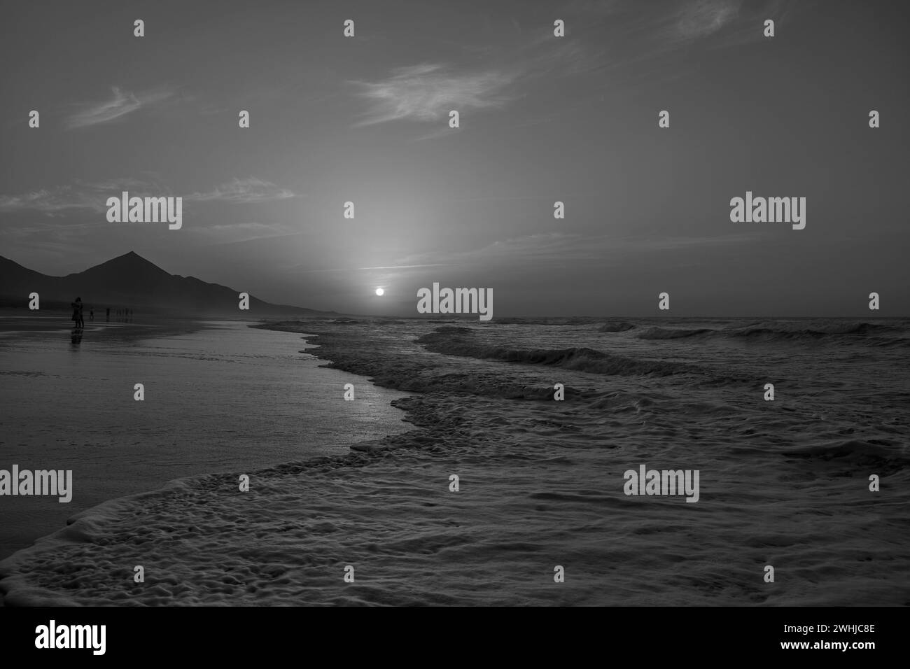 Sunset on Cofete beach in Fuerteventura in Jandia Natural Park with silhouettes and Stock Photo