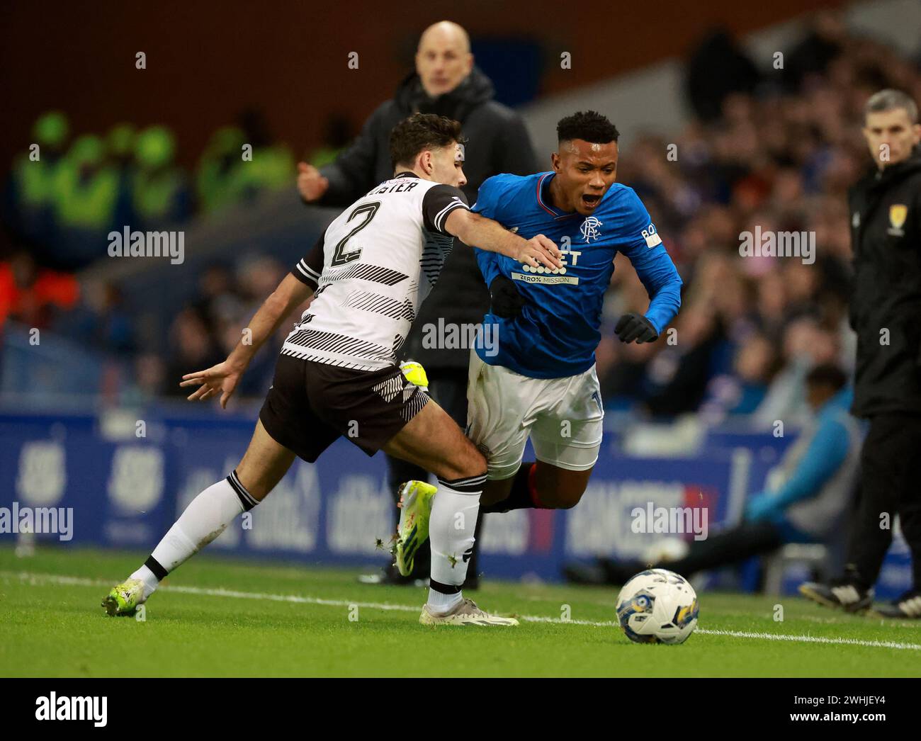 Rangers' Oscar Cortes (right) gets past Ayr United's Nicholas ...