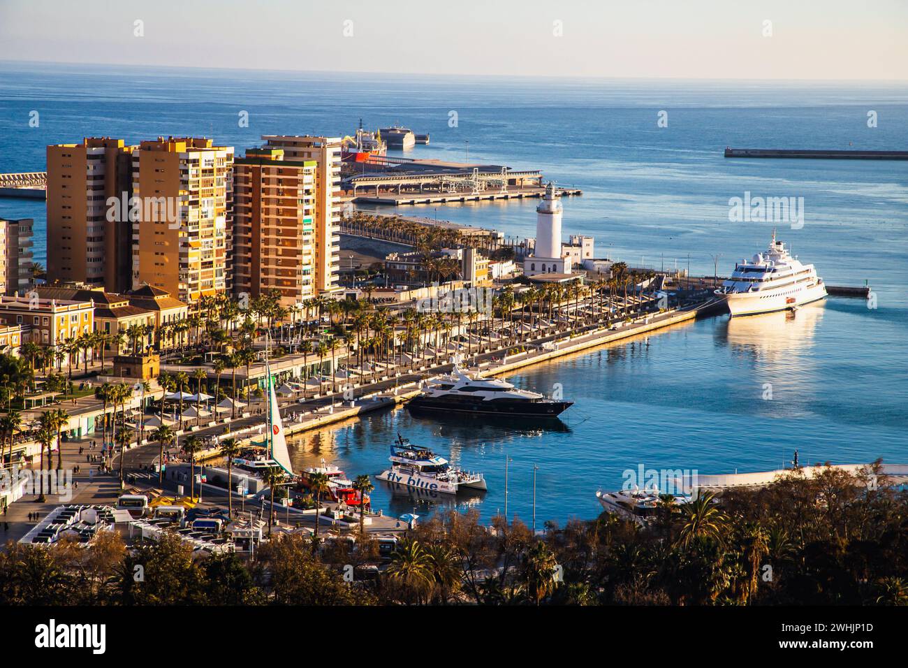 View over Malaga at sunset travel banner Stock Photo
