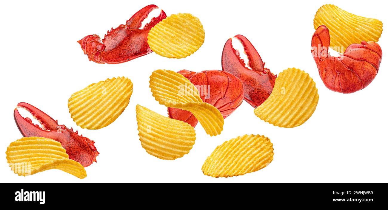 Falling ridged potato chips with lobster isolated on white background Stock Photo