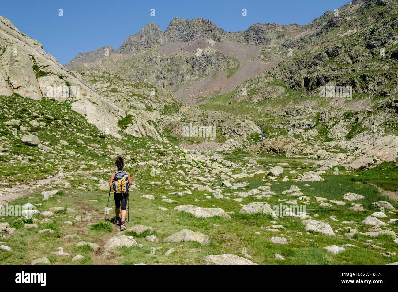 Hiker on Ibones azules and BachimaÃ±a alto route Stock Photo