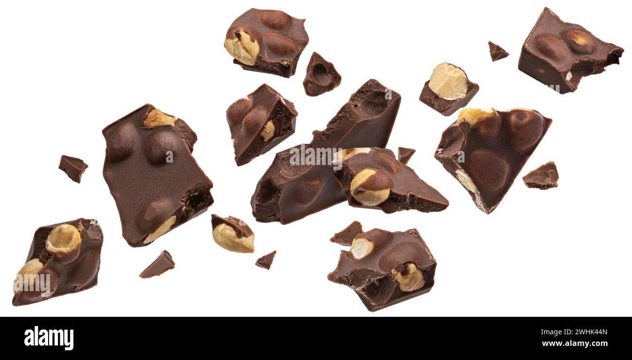 Dark chocolate chunks with hazelnut isolated on white background Stock Photo