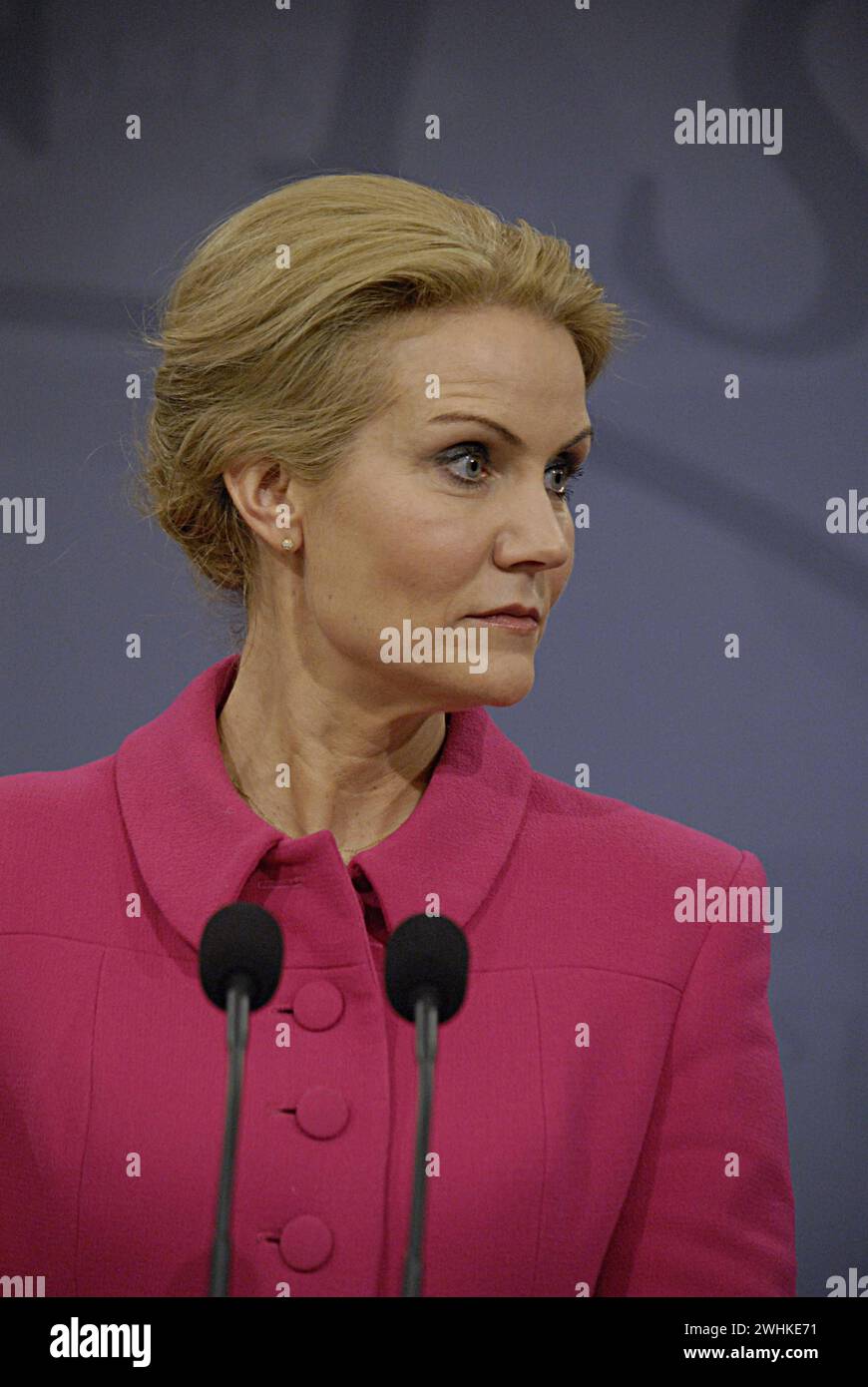 COPENHAGEN /DENMARK- 03 February 2014  Denmark s prime minister Ms. Helle Thorning-Schmidt in pink dress and leader of danish social democrat party and Ms.Margrethe Vestager vice prime minister and minister for economy and home minister right to prime minister in short hair dark dress and leader of danish radical political party hold joint press conference after reshaping cabint at Mirror hall at PM office at christionsborg today on monday Stock Photo