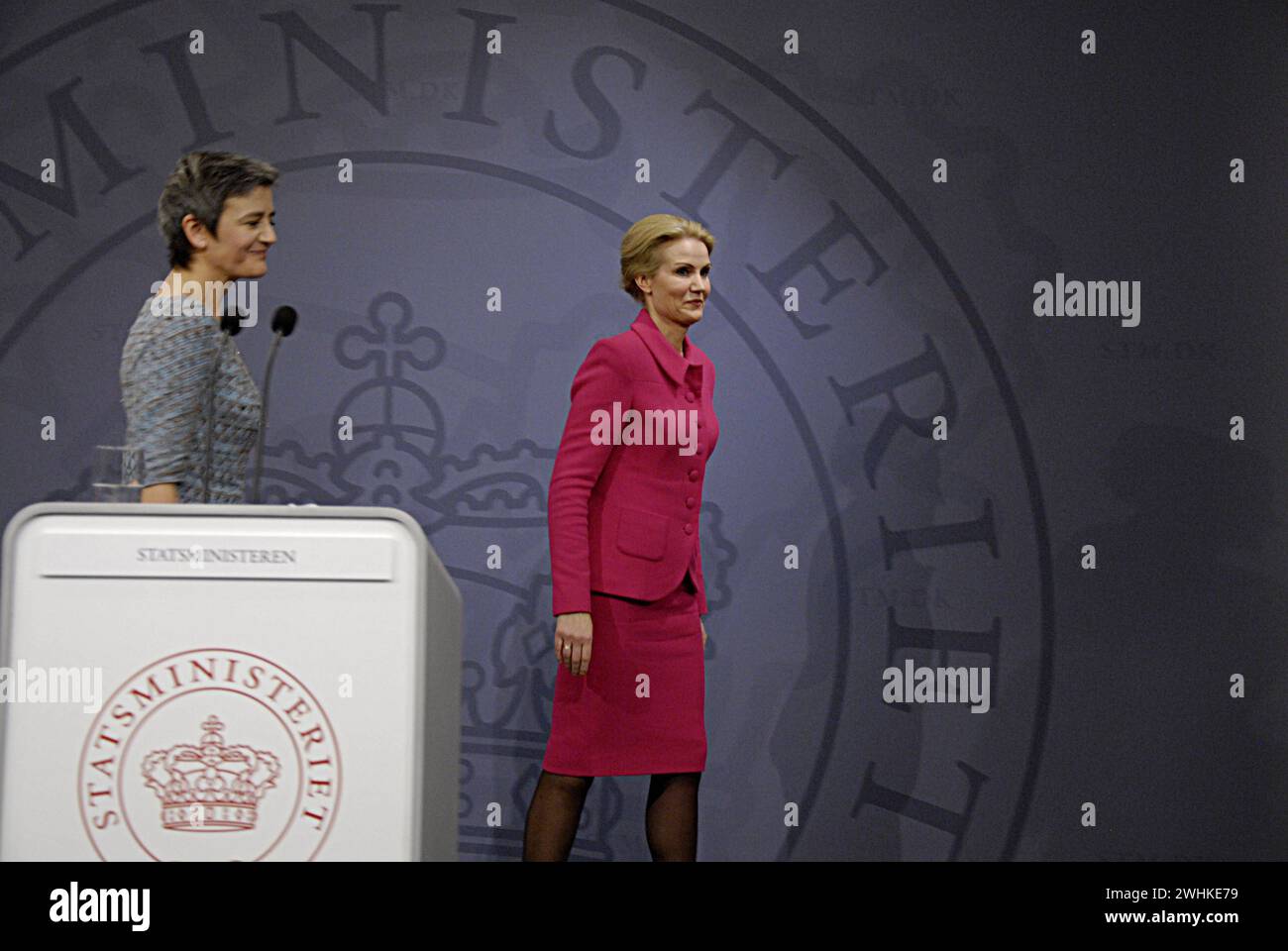 COPENHAGEN /DENMARK- 03 February 2014  Denmark s prime minister Ms. Helle Thorning-Schmidt in pink dress and leader of danish social democrat party and Ms.Margrethe Vestager vice prime minister and minister for economy and home minister right to prime minister in short hair dark dress and leader of danish radical political party hold joint press conference after reshaping cabint at Mirror hall at PM office at christionsborg today on monday Stock Photo