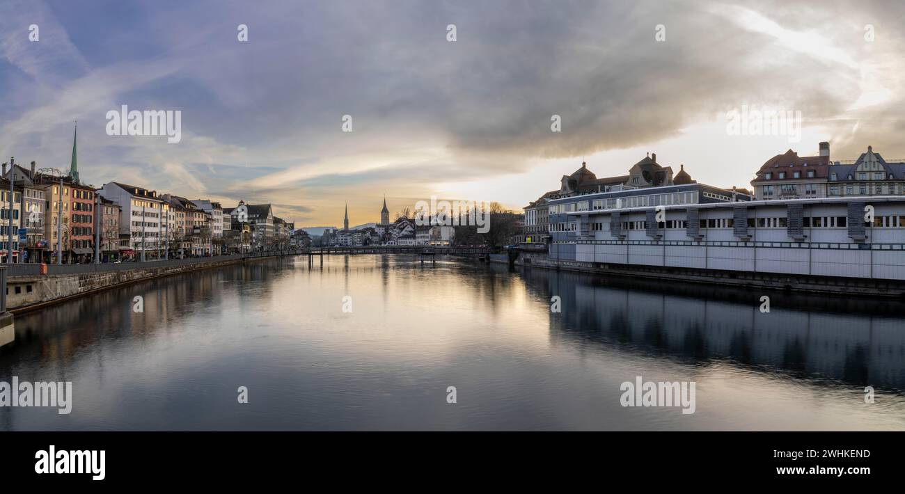 Evening panorama from the railway station bridge, Coop Provisorium on the right, Limmatquai on the left, City of Zurich, Canton of Zurich, Switzerland Stock Photo