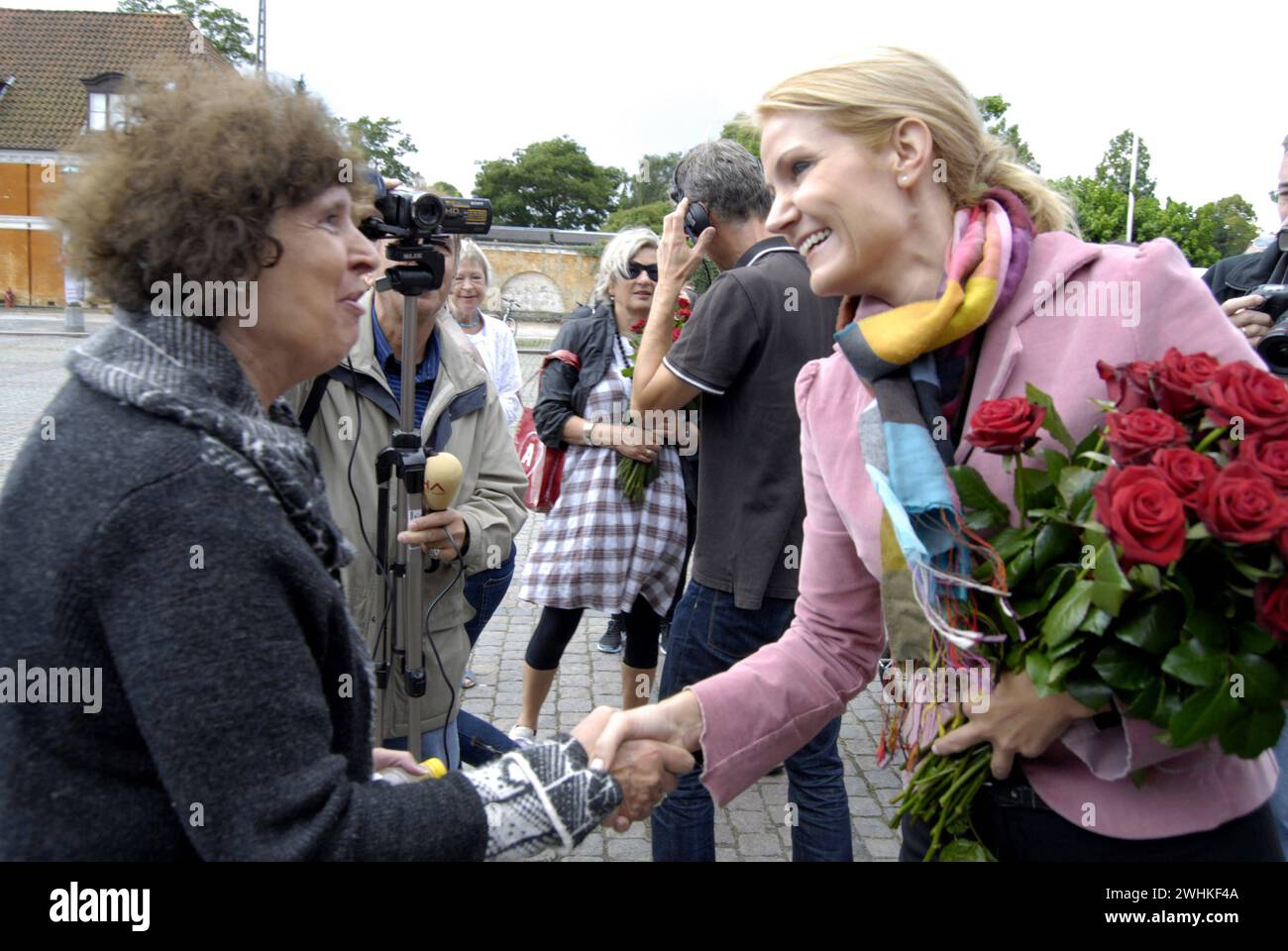 COPENHAGEN  DENMARK. Helle Thorning -Schmidt,oppostion social democrat leader and candiate for prime minister post for social democrat party on her elections compaign,meet her voters and some are really angry social democrat ,Helle met her party soldiers /workers and danish voter, danish General parliament elections will take plass on sept.25, 2011, Helle today spends her morning at frederiksberg have gives free red roses to voters, she met her muslim member of parlia from Turkey and Pakistan, these are cadidate for parliaments 28 August 2011 PHOTOS BY FRANCIS JOSEPH DEAN/DEAN PICTURES Stock Photo