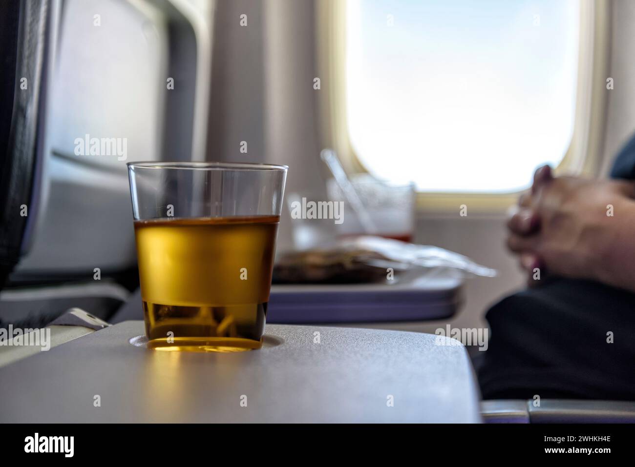 Apple juice in an airplane Stock Photo