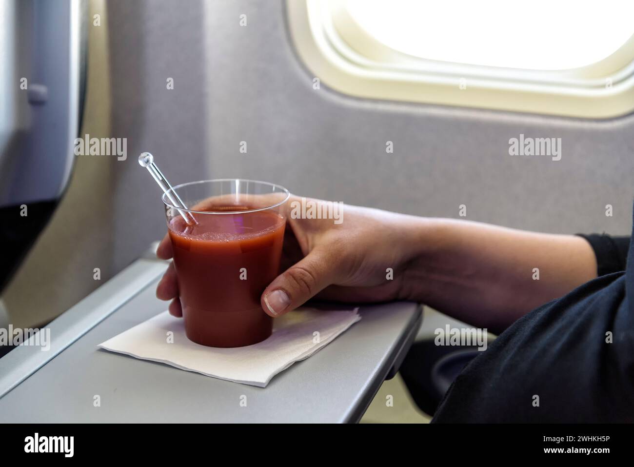 Tomato juice in an airplane Stock Photo