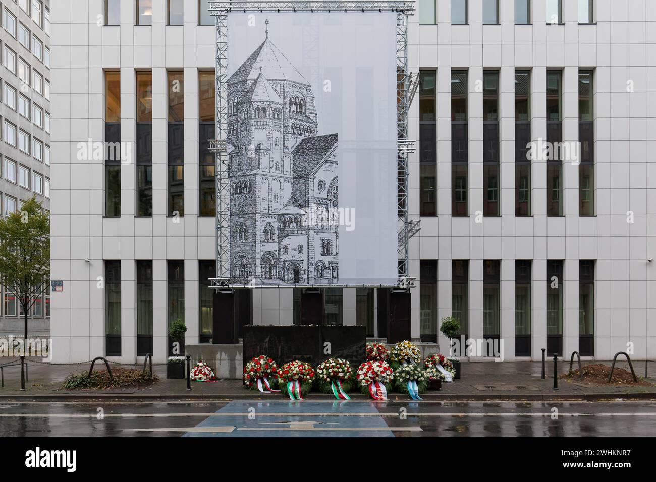 Memorial stone and large photo of the old synagogue at its former ...