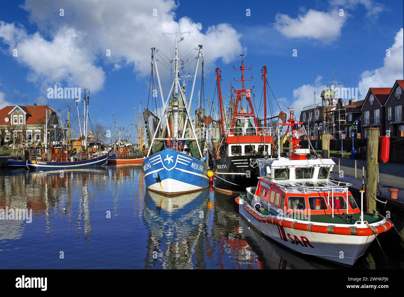 The old harbour of Neuharlingersiel, East Frisia, island ferry to Spiekeroog, ferry, fishing boats, shrimp cutter, fishing cutter, cutter regatta Stock Photo
