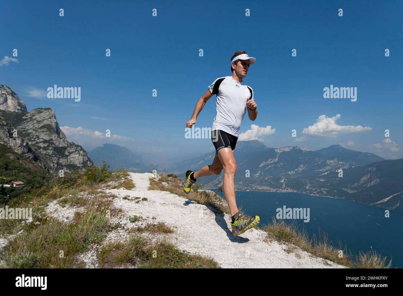 Man running at lake garda hi-res stock photography and images - Alamy