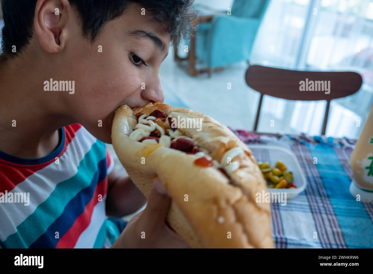 Eating a big sandwitch in the breakfast Stock Photo