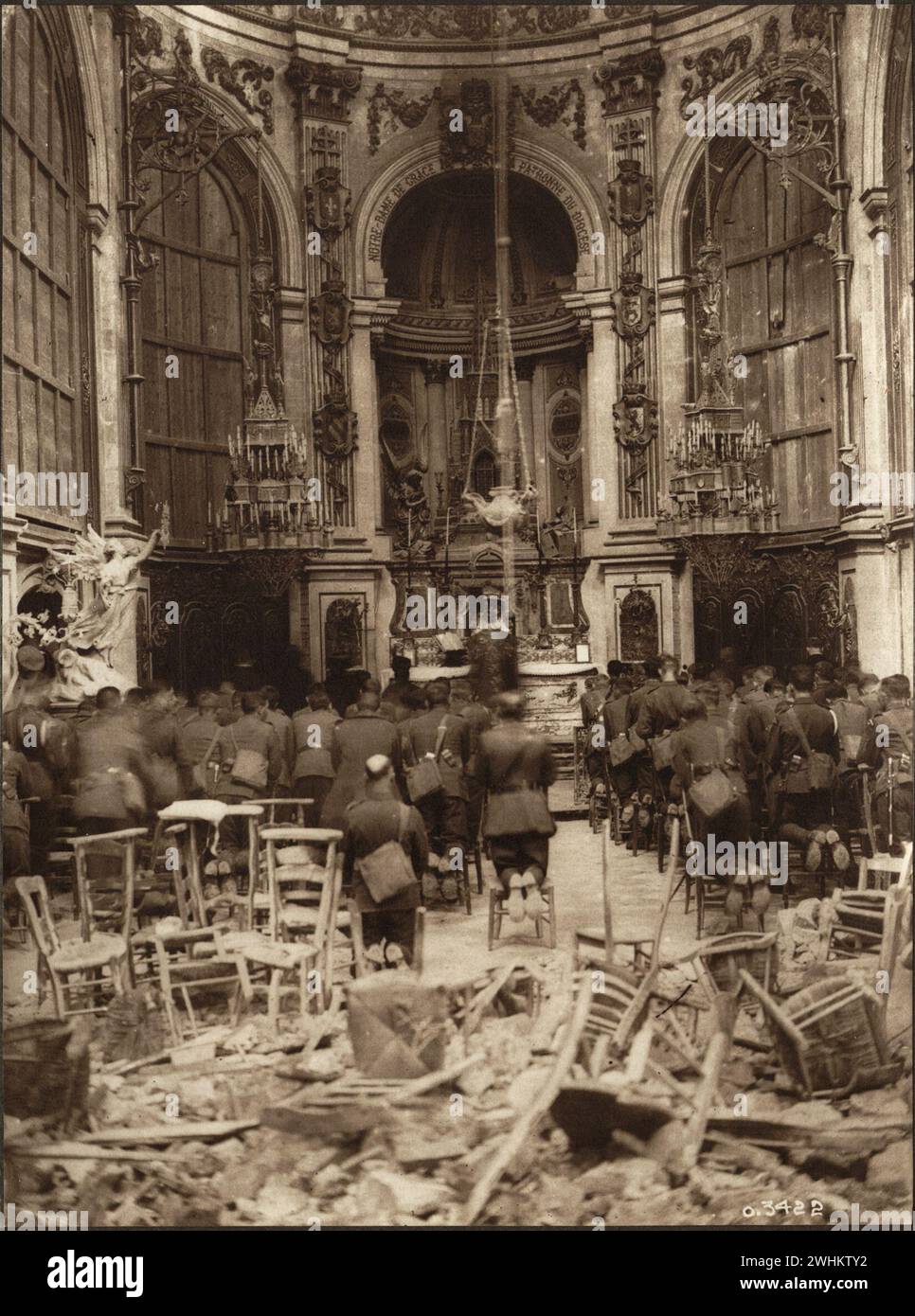 A Thanksgiving Service attended by Canadian troops being held in the Cambrai Cathedrals which has sustained significant damage, but serves the purpose for the service.  Images from Canadian Forces in First World War France October 1917 Stock Photo