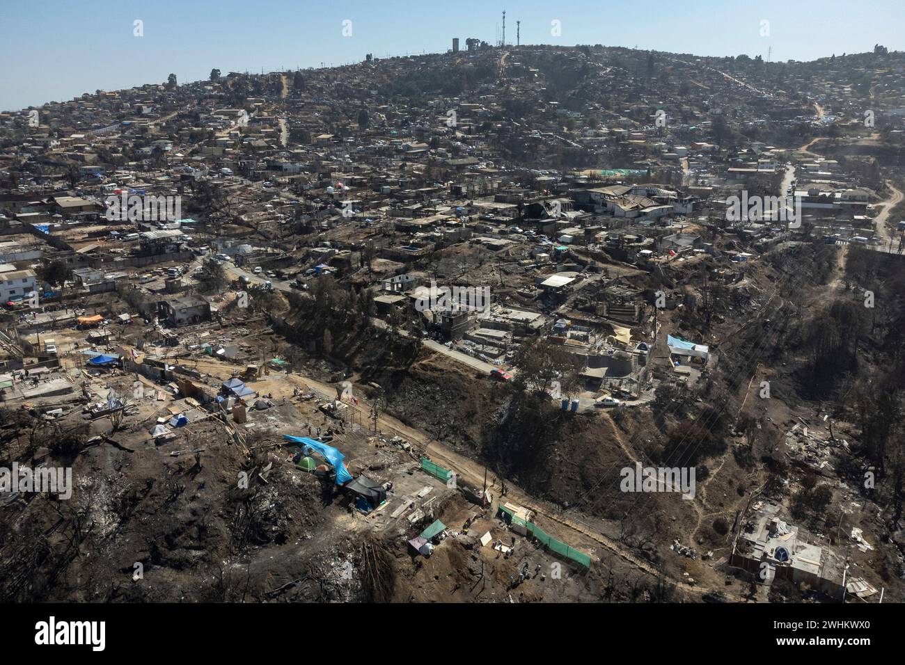 Vina Del Mar, Valparaiso, Chile. 10th Feb, 2024. Aerial view of the Achupallas sector in Vina del Mar that was affected by the forest fire. (Credit Image: © Jose Veas Tapia/ZUMA Press Wire) EDITORIAL USAGE ONLY! Not for Commercial USAGE! Stock Photo