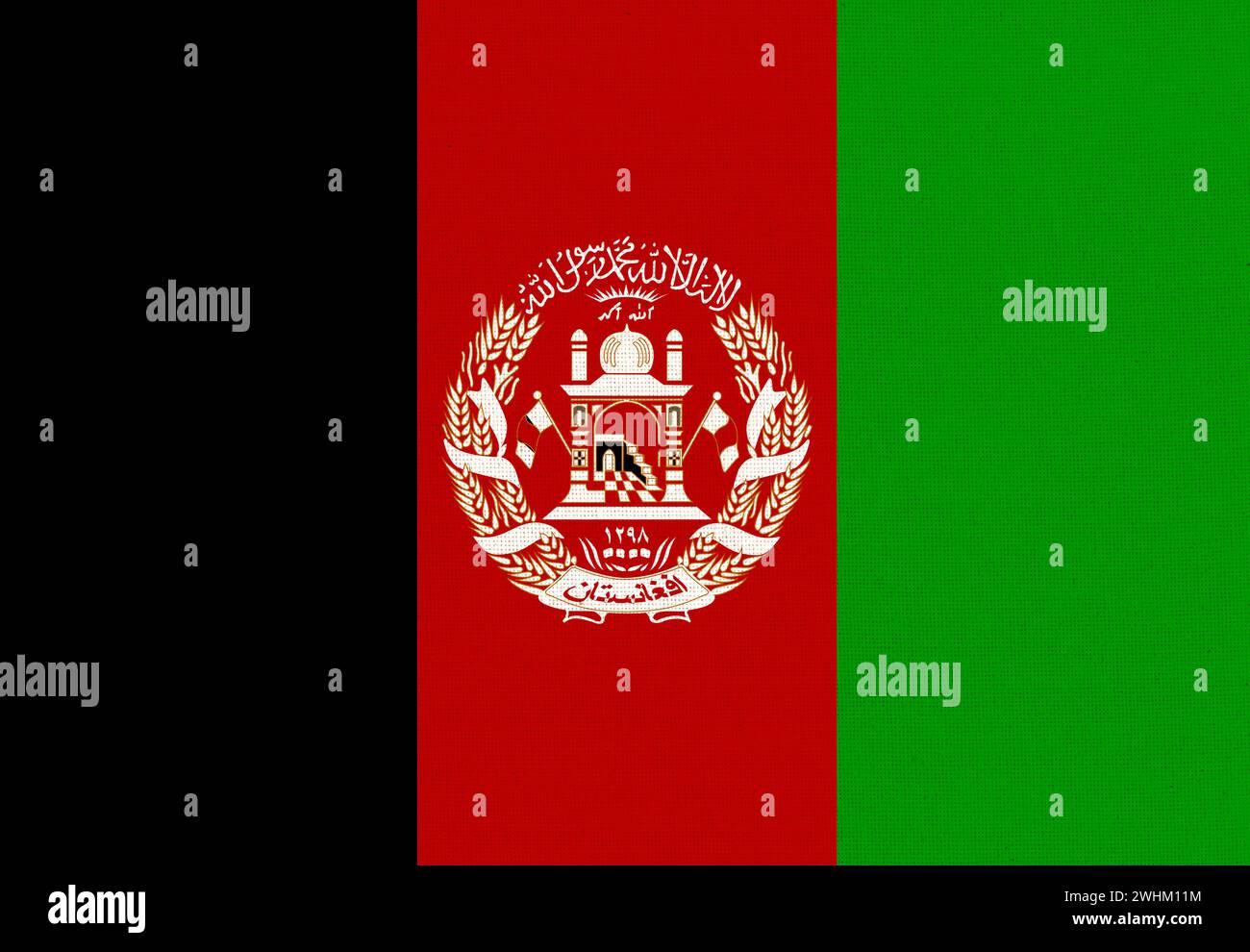 Flag of Afghanistan. Afghanistan flag on fabric surface. Afghan national flag on textured background Stock Photo