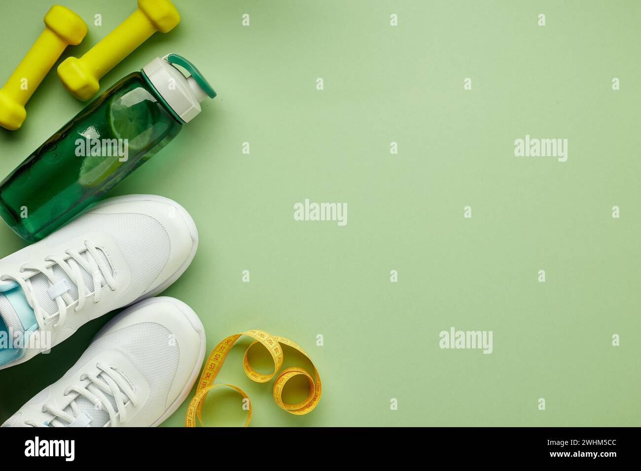 Creative flat lay of sport and fitness equipments. Stock Photo