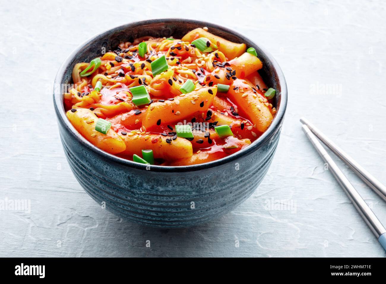 Rabokki, tteokbokki or topokki with ramen, Korean street food, spicy ...