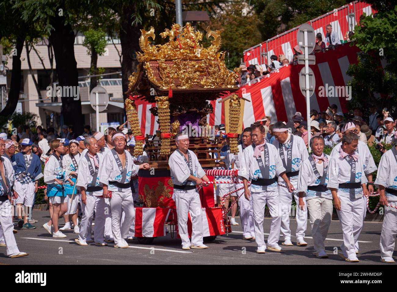 Procession of Kagura Yakata, small altars decorated with gold leaf, during Nagoya festival. Japan Stock Photo