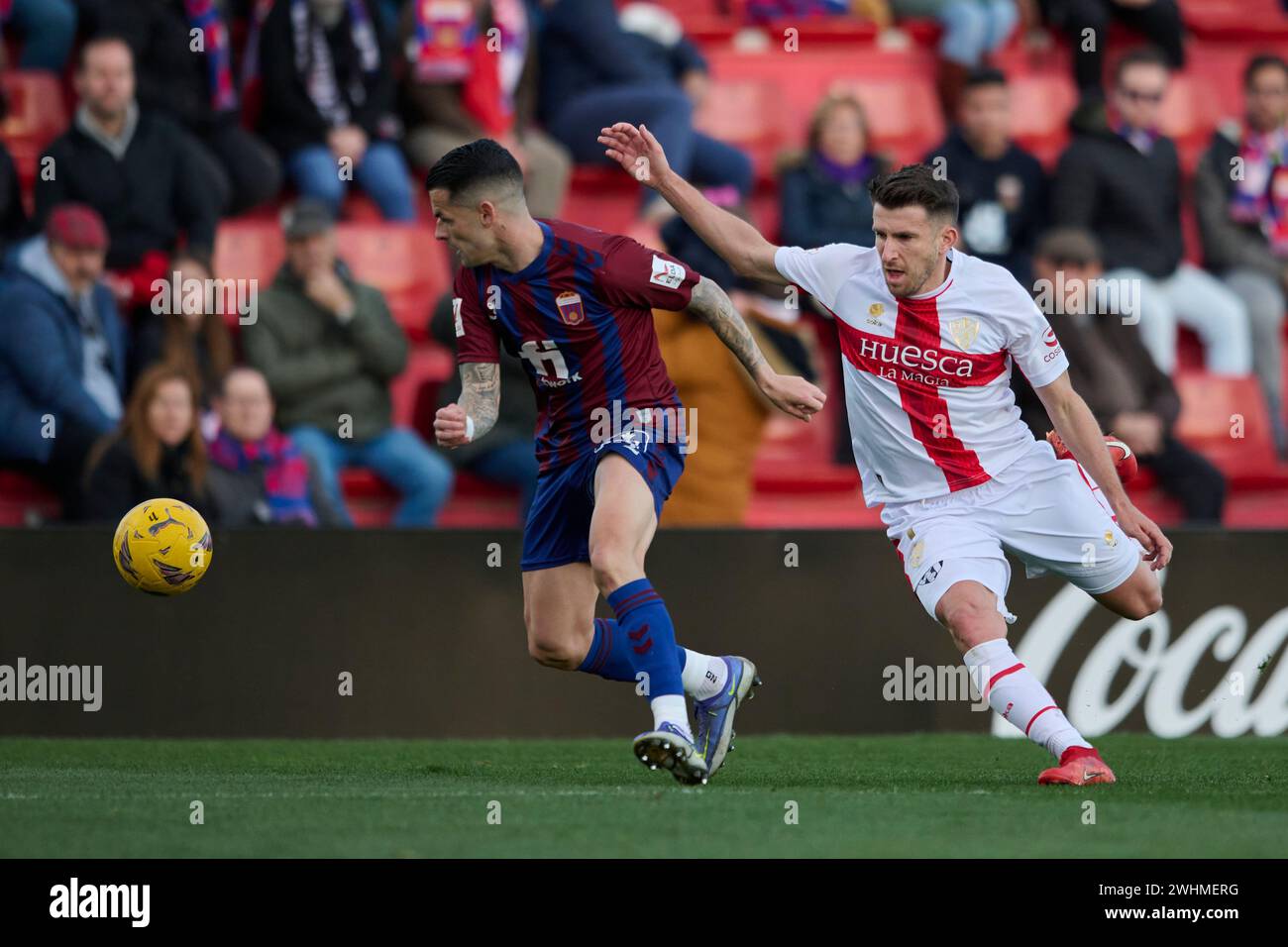 ELDA, SPAIN - FEBRUARY 10: Alex Martinez of CD Eldense competes for the ball with Javi Martinez Attacking Midfield of SD Huesca during the LaLiga Hypermotion match between CD Eldense and SD Huesca at Nuevo Pepico Amat Stadium on February 10, 2024 in Elda, Spain. (Photo by Francisco Macia/Photo Players Images) Stock Photo