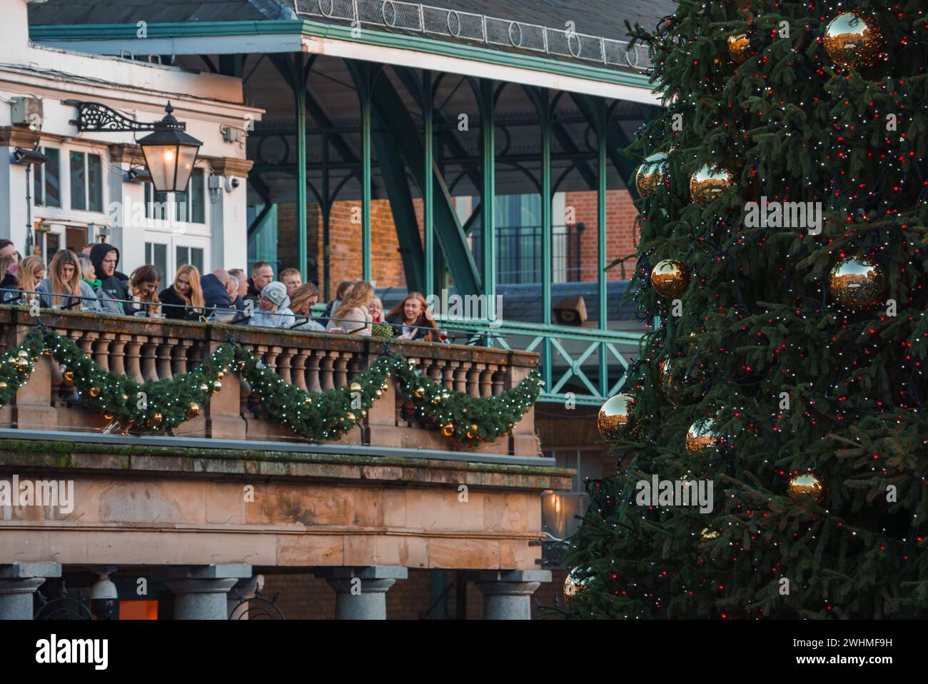 Enjoy a Festive Christmas Gathering on a Beautifully Decorated London Balcony Stock Photo