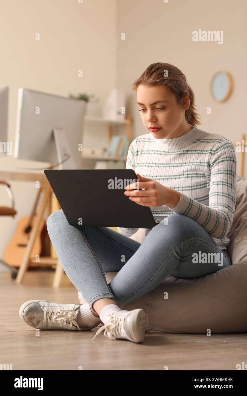 Female programmer working with laptop in office Stock Photo - Alamy