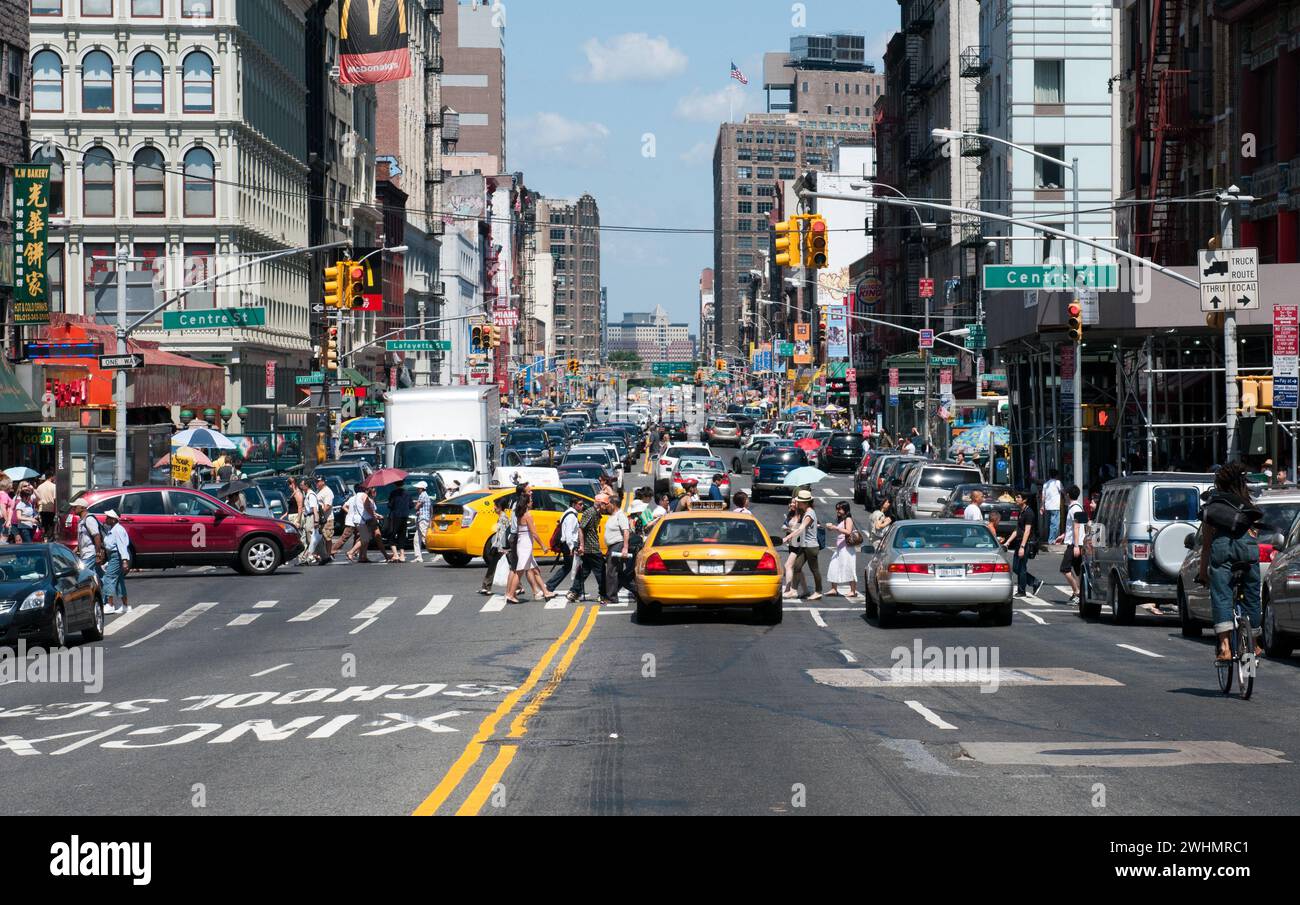 Rush busy hour with people and vechicles at the streets of New York City nyc USA Stock Photo
