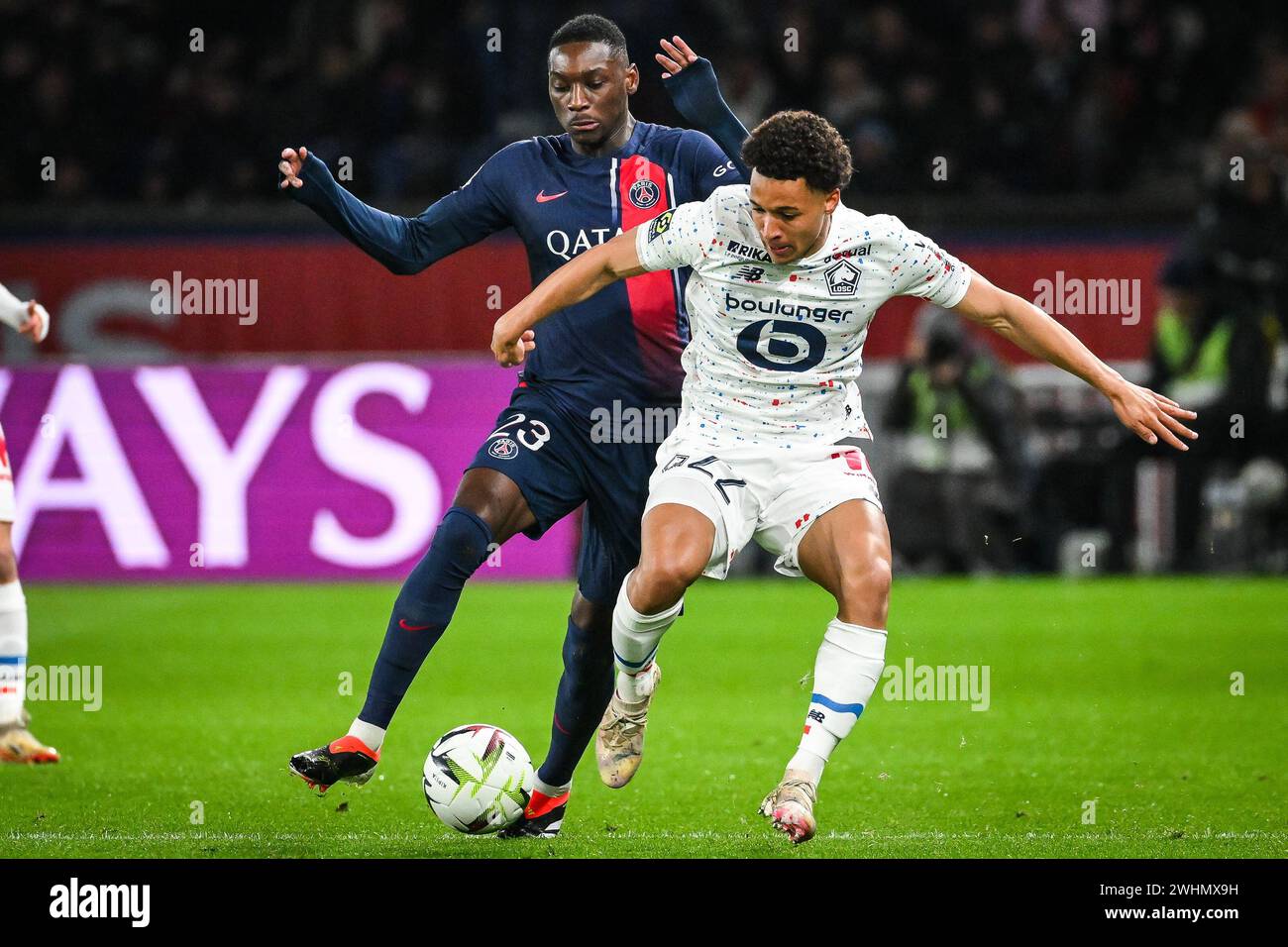 Randal KOLO MUANI of PSG and Tiago SANTOS of Lille during the French ...