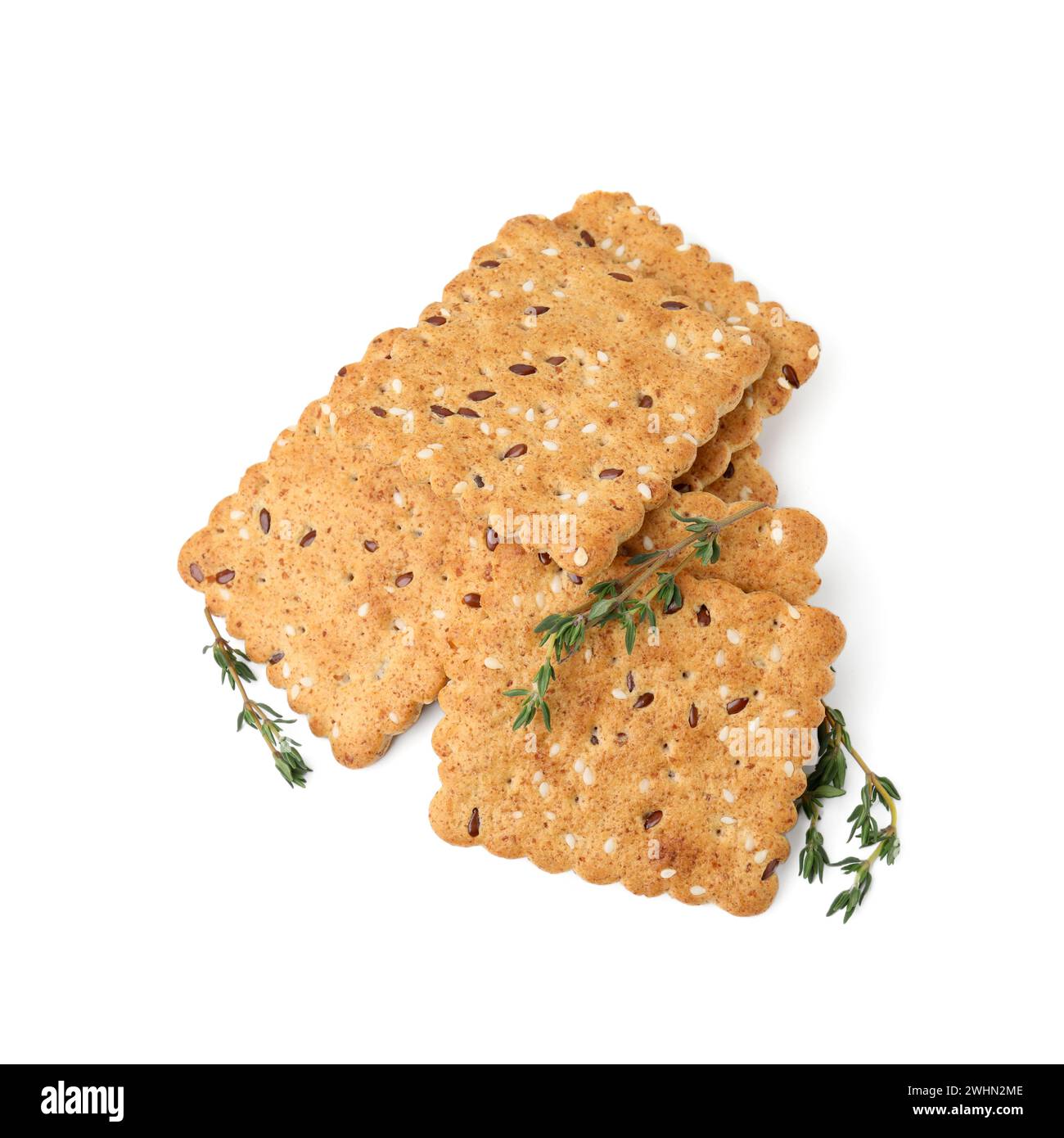 Cereal crackers with flax, sesame seeds and thyme isolated on white ...