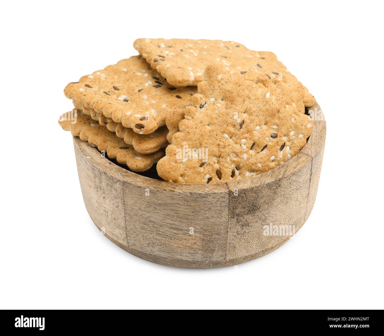 Cereal crackers with flax and sesame seeds in bowl isolated on white ...
