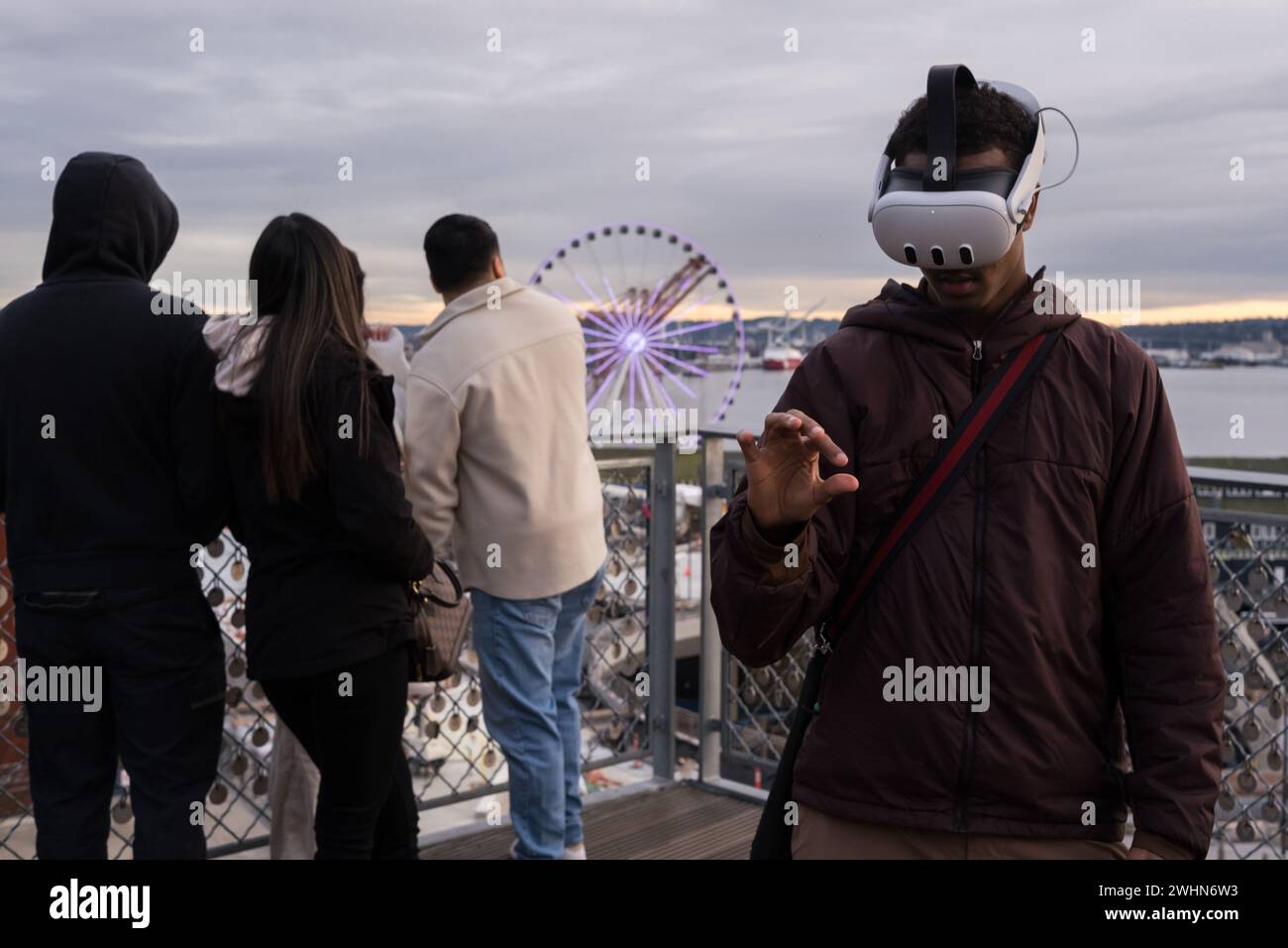 Seattle USA 10th Feb 2024 People Wearing Virtual Reality Headsets In   Seattle Usa 10th Feb 2024 People Wearing Virtual Reality Headsets In The Busy Pike Place Market The Future Of Mixed Reality Is Becoming The Newest Tech Trend Rapidly Spreading Across The World Credit James Andersonalamy Live News 2WHN6W3 