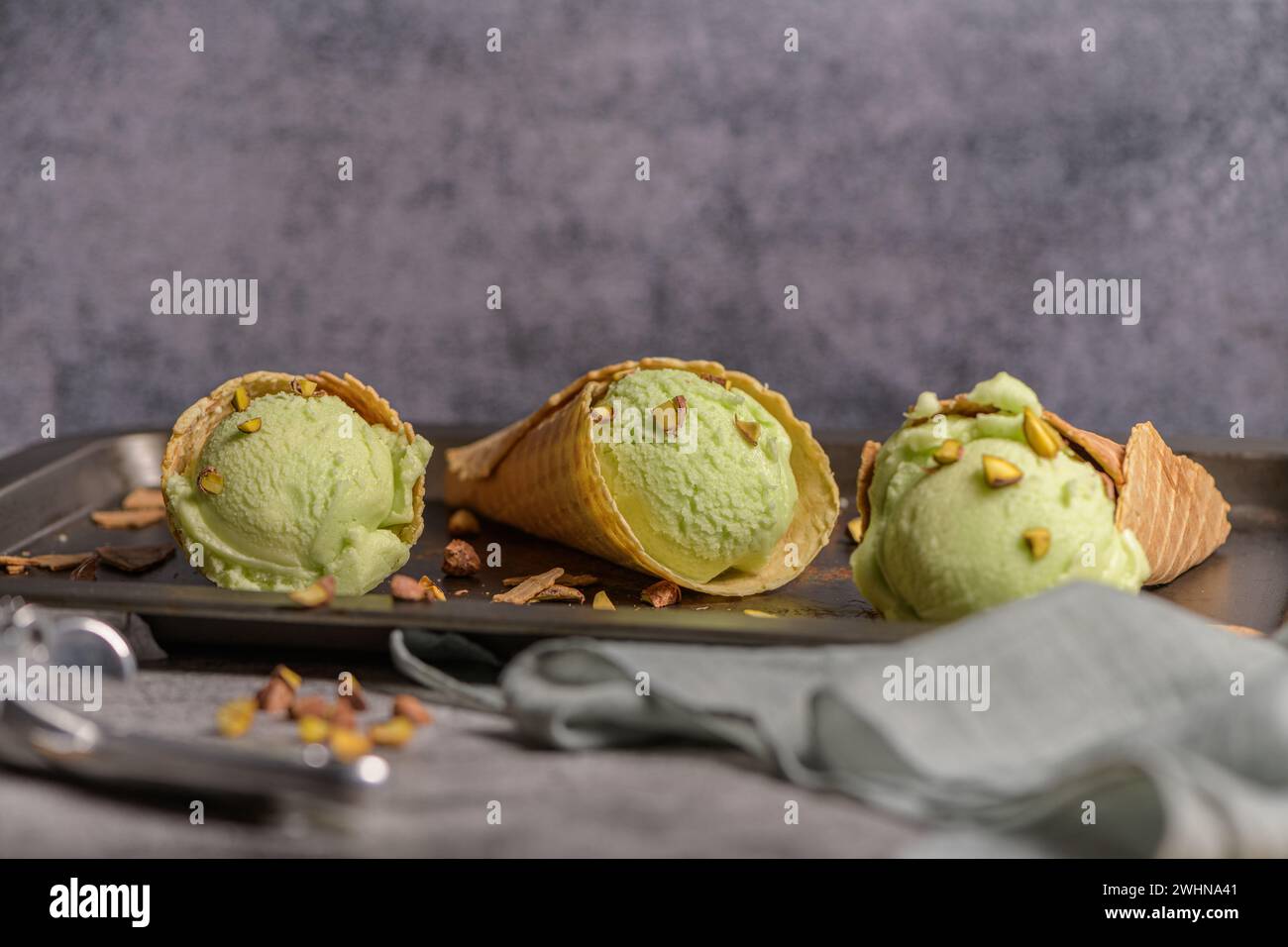 Pistachio ice cream in waffle cones Stock Photo - Alamy