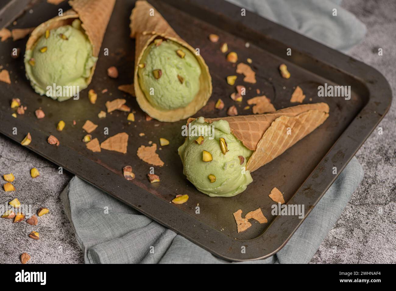Pistachio ice cream in waffle cones Stock Photo - Alamy