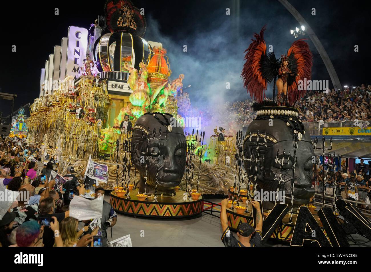 Dancers from the Vai-Vai samba school perform on a float during a ...