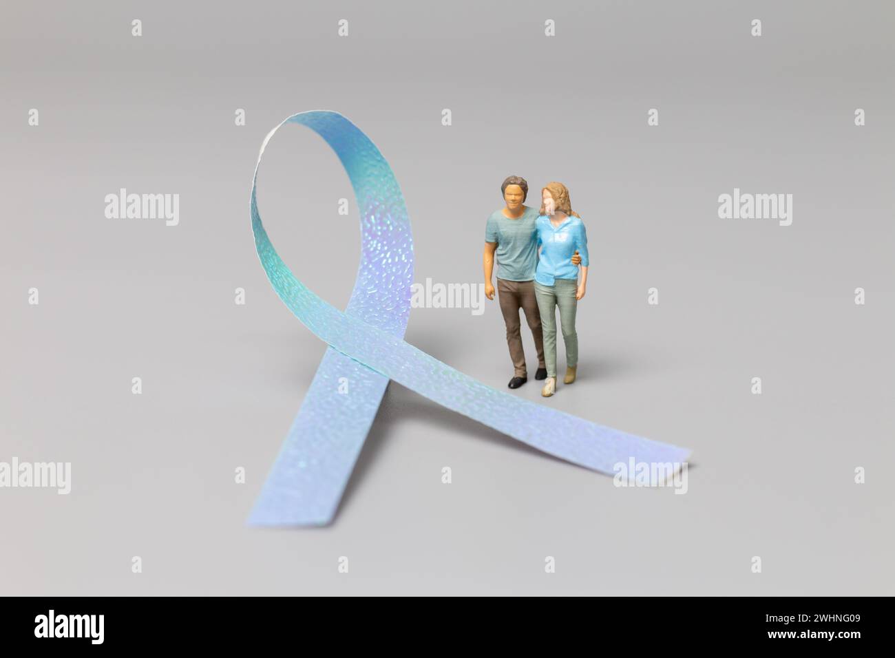 Couple standing in front a ribbons , World cancer day concept Stock Photo