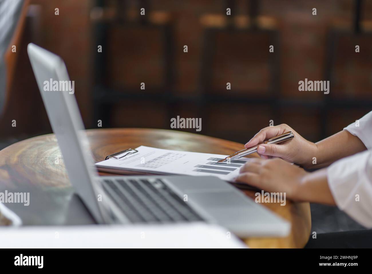 Happy young Asian Woman working on computer Business Data Analyst. Stock Photo