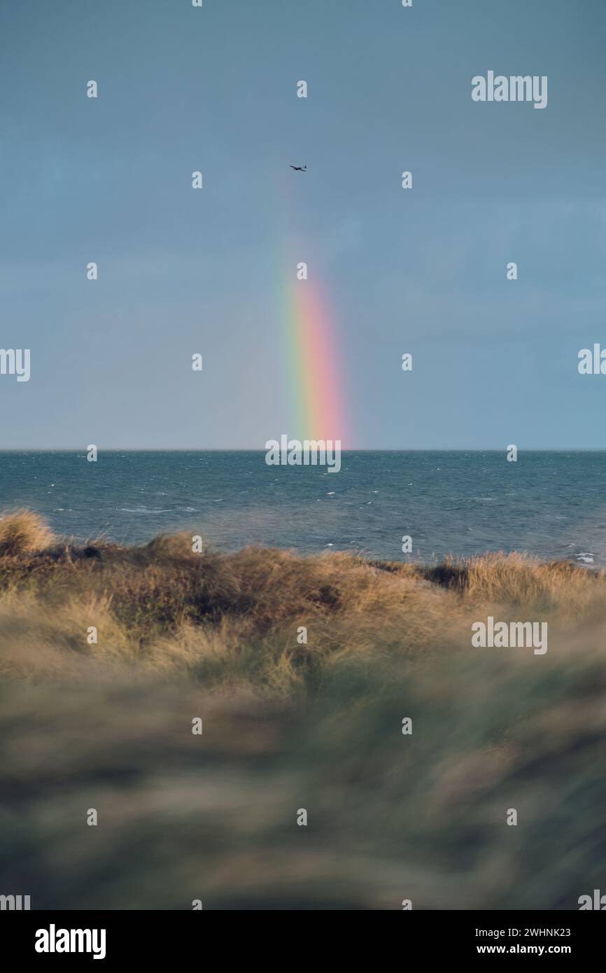 Rainbow over northe Sea Stock Photo