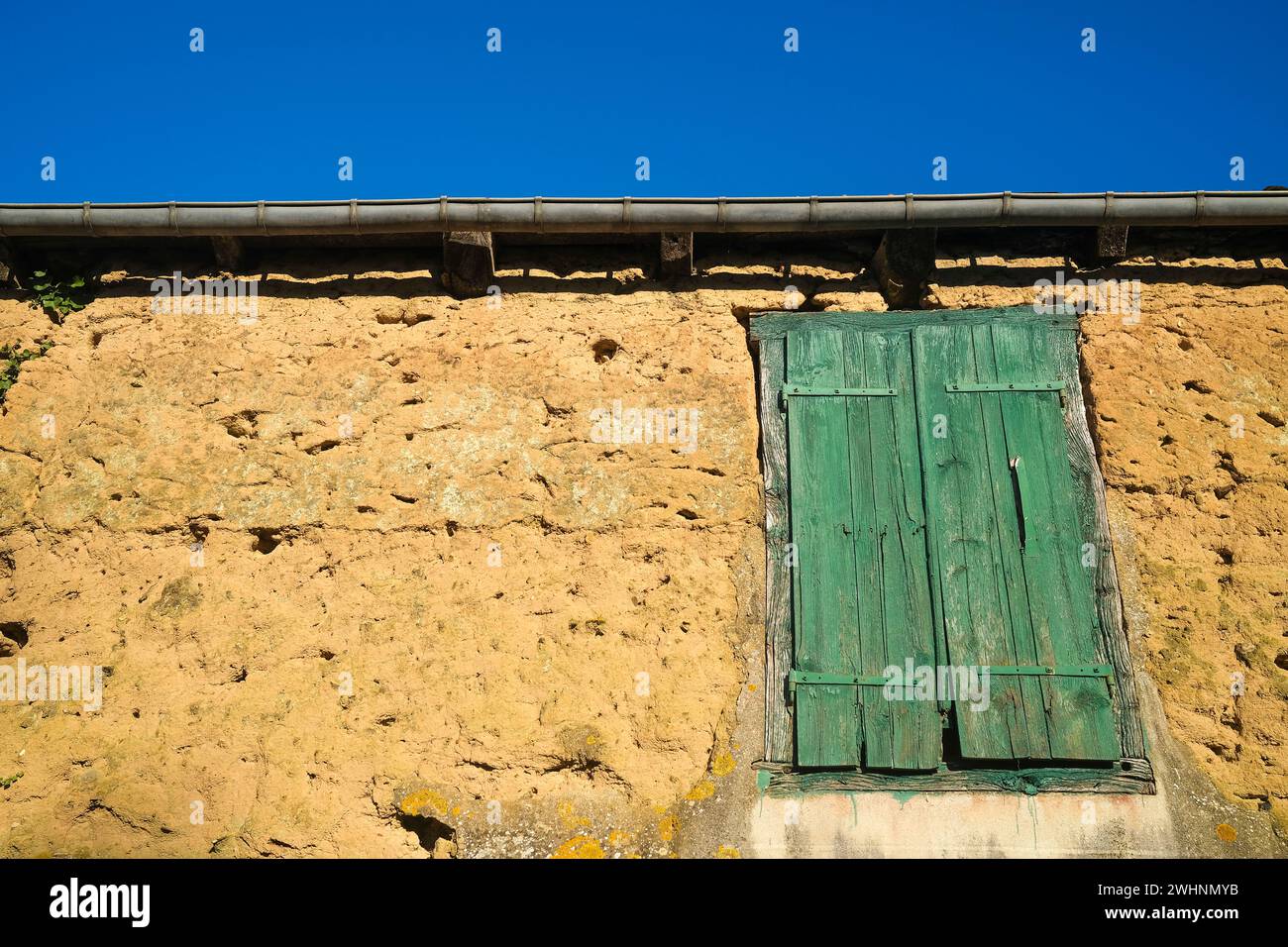 Rustic rural closed old timber window shutter Stock Photo