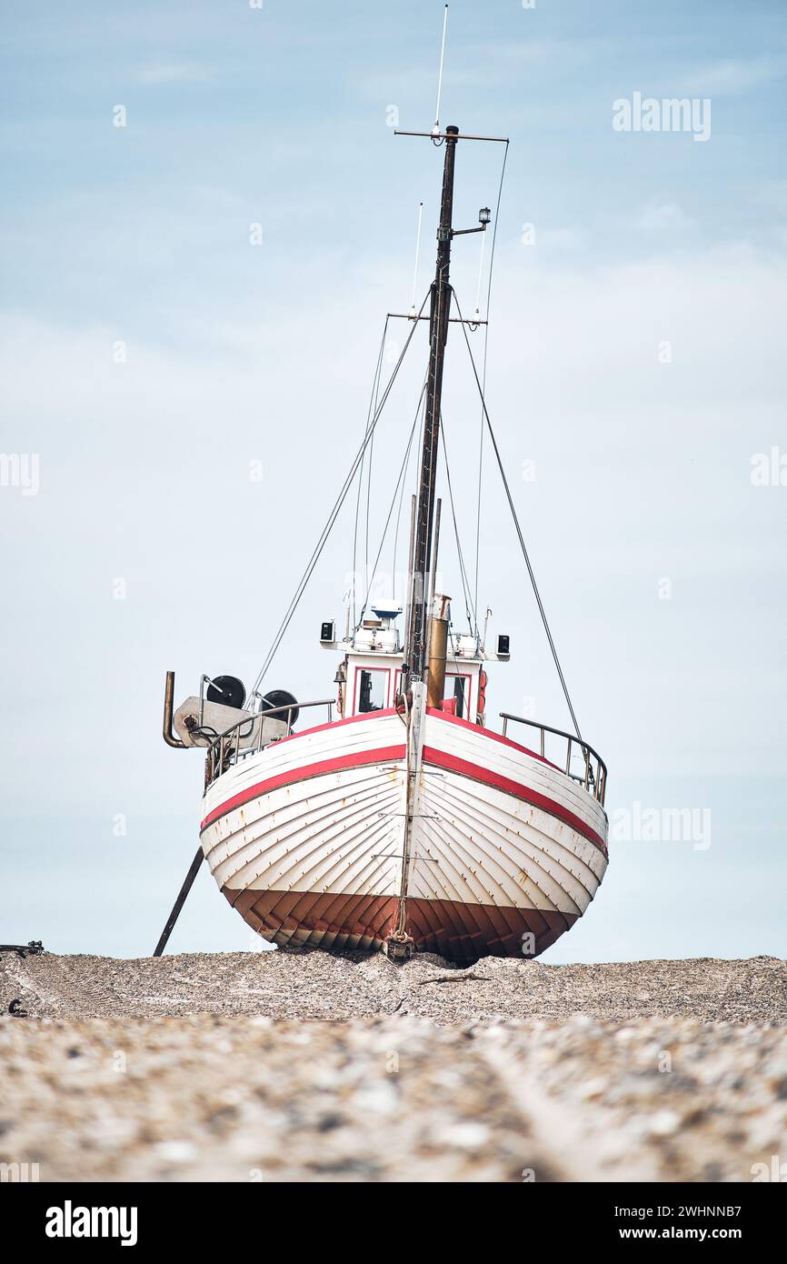 Boat lying on the beach Stock Photo - Alamy