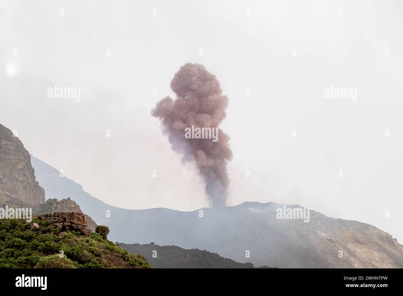 Smoke from the erupting volcano on the island of Stromboli Stock Photo