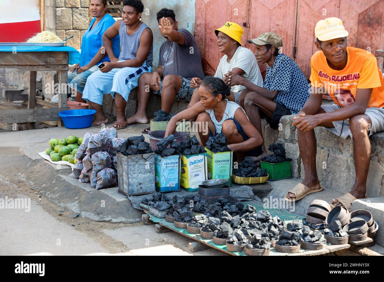Street market in Miandrivazo, woman selling charcoal. Madagascar Stock Photo