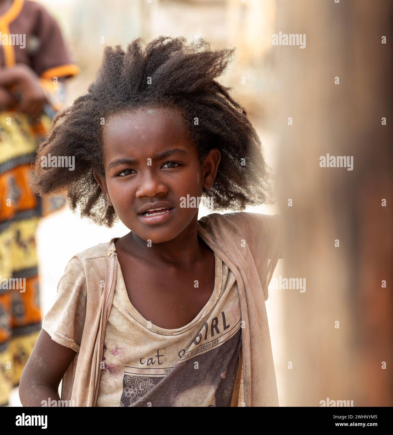 Small cute Malagasy girl with long hair , little dancer on celebration