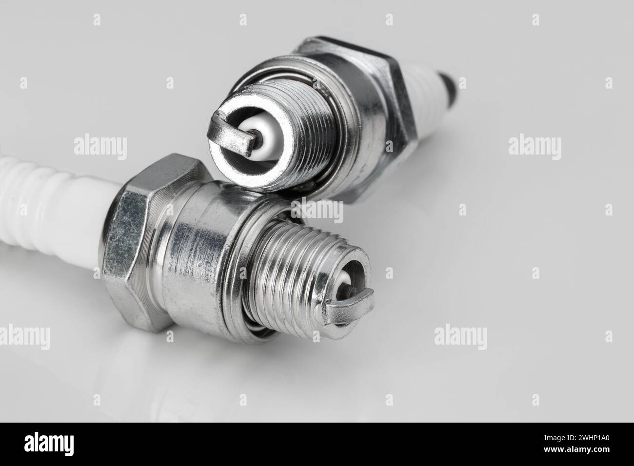 Two spark plugs hi-res stock photography and images - Alamy