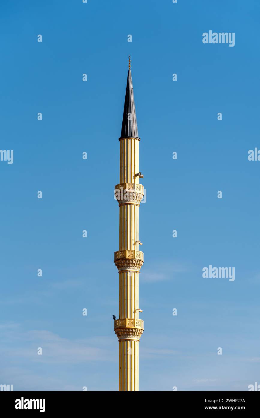 One minaret of traditional Islamic mosque in Grozny Chechnya Stock Photo